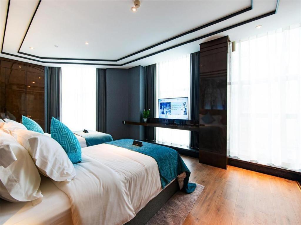 Xana Hotelle-Hotel Luzhou Baizitu Square Экстерьер фото