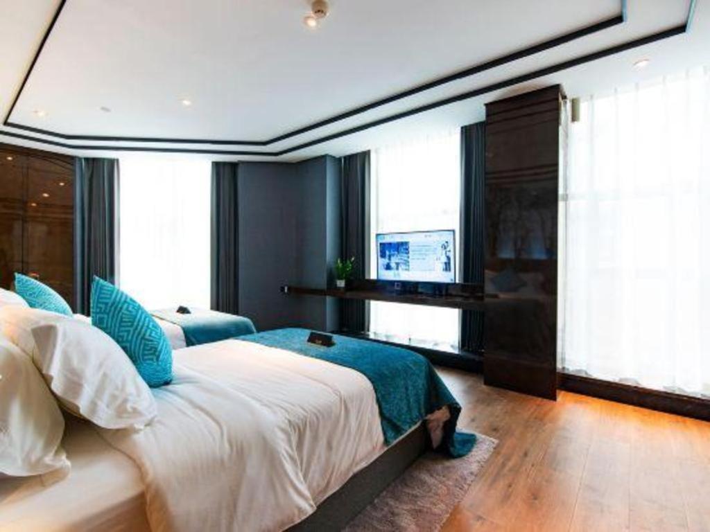 Xana Hotelle-Hotel Luzhou Baizitu Square Экстерьер фото