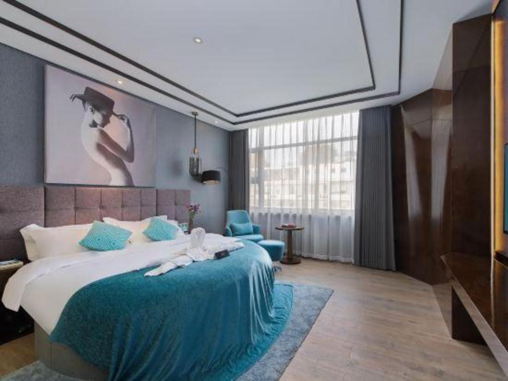 Xana Hotelle-Hotel Luzhou Baizitu Square Экстерьер фото