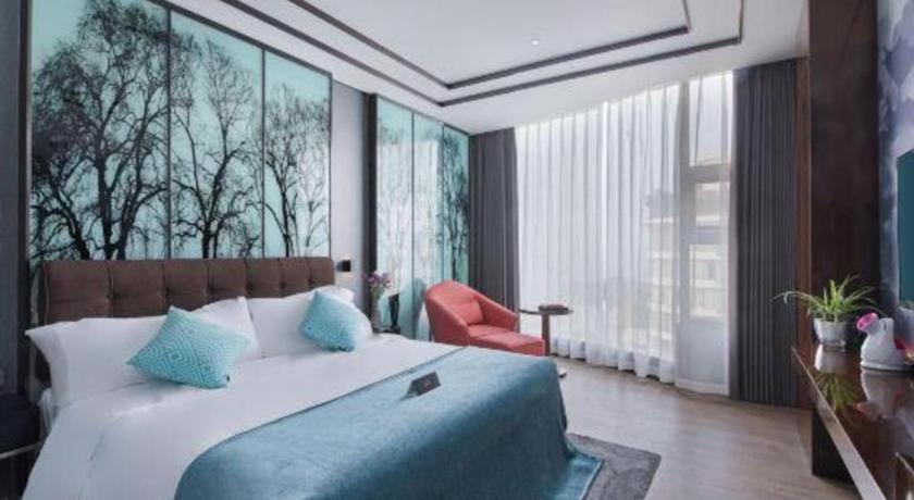 Xana Hotelle-Hotel Luzhou Baizitu Square Экстерьер фото