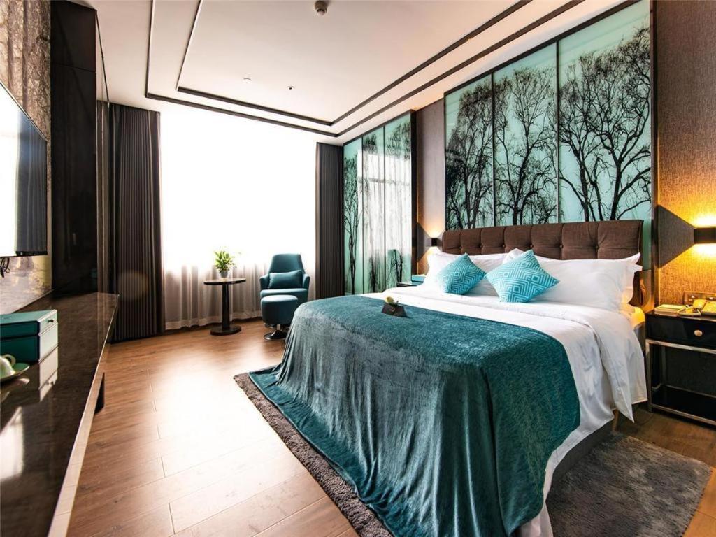 Xana Hotelle-Hotel Luzhou Baizitu Square Экстерьер фото